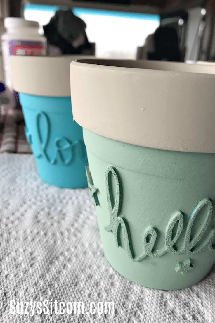 Paint top edge of pots with contrasting color.