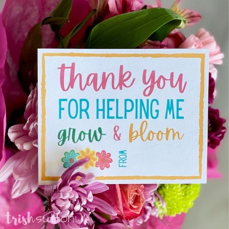 Teacher Appreciation notecard on a bouquet of flowers.