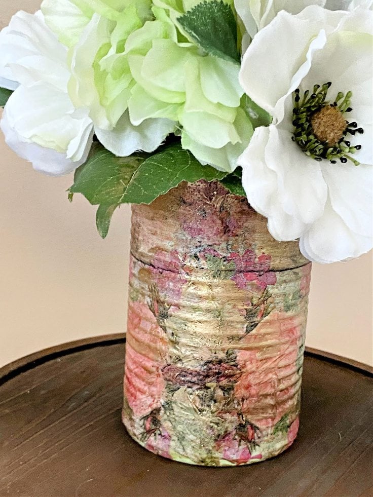 close up of tin can vase