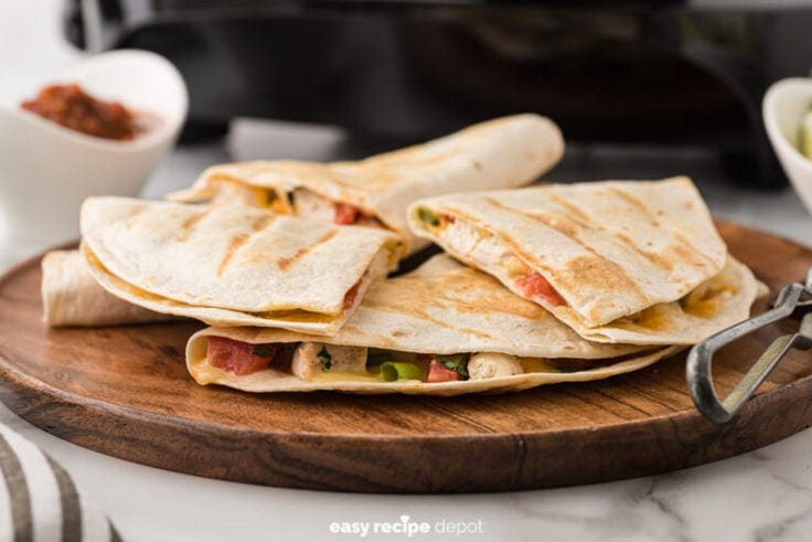 A plate of chicken quesadillas