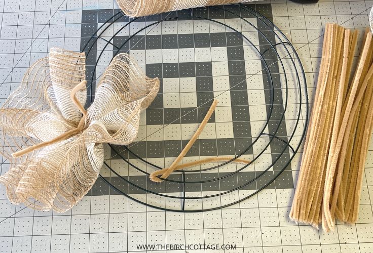 Attaching deco mesh to a wire wreath form