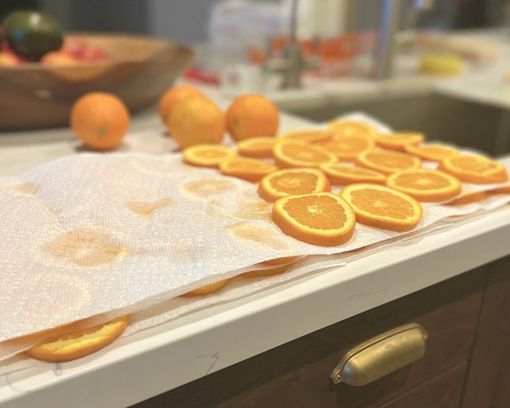 Sliced oranges on a paper towel 