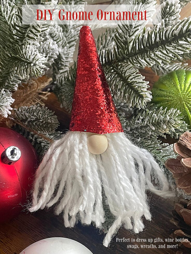 DIY gnome ornament on a Christmas tree.