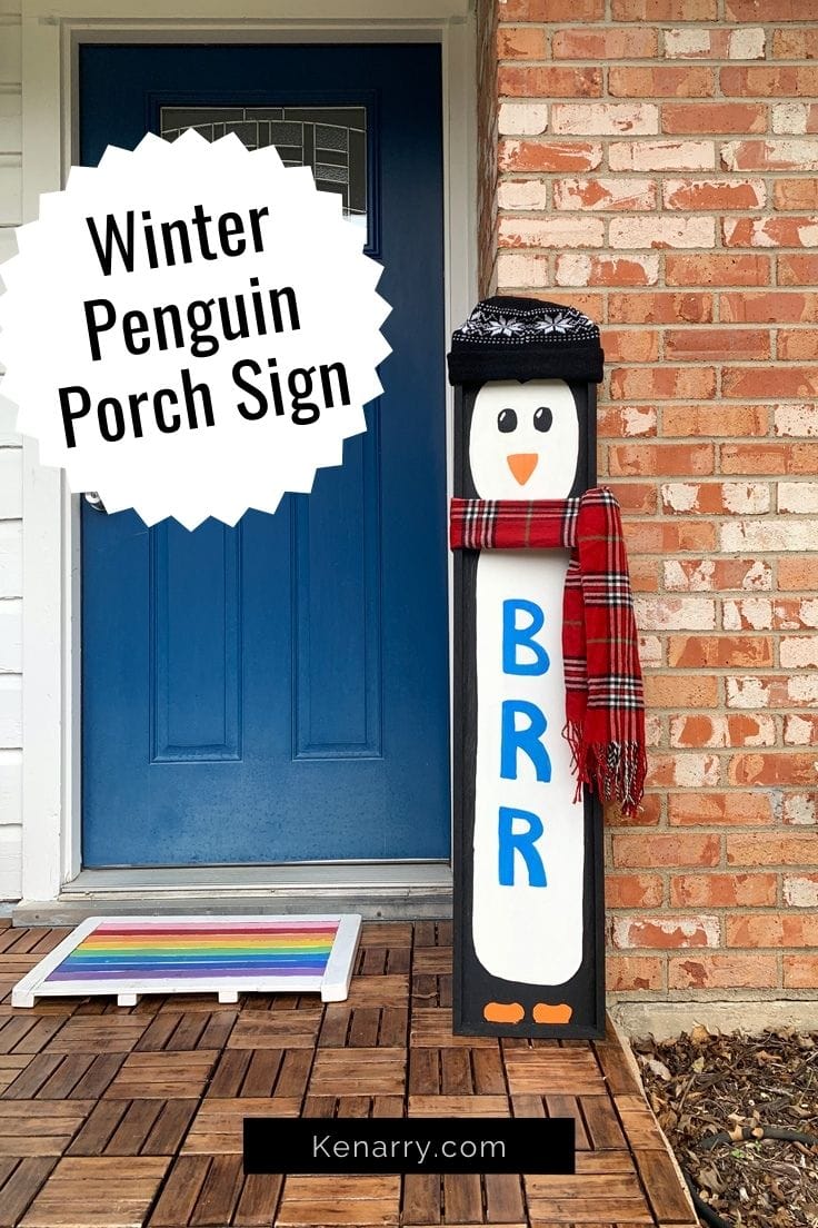 Winter penguin porch sign wearing a real hat and scarf.