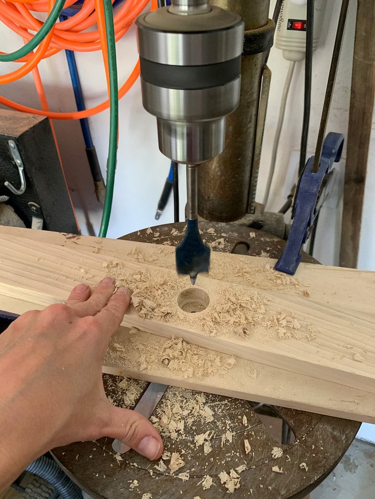 A drill press and a spade bit was what I had on hand when I drilled the holes in my rails for the rungs to join in to.