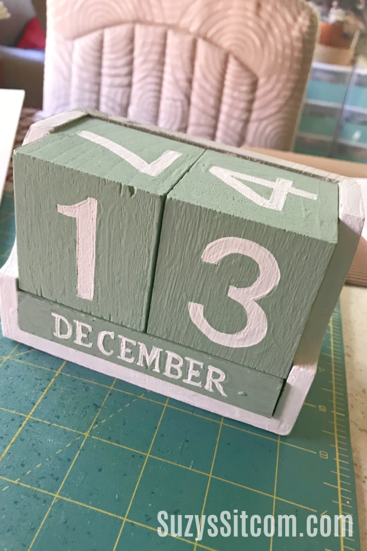 The painted wooden perpetual calendar