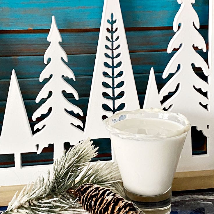 white cosmo on tray with wooden trees