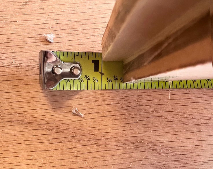 A measuring tape shows 3/8