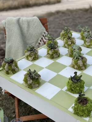 Green and White checkerboard outdoor table.