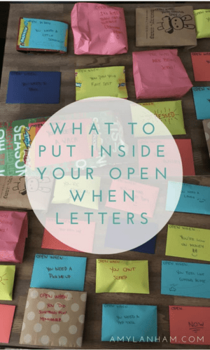 Letters on a table with what to put inside your open when letters written in front