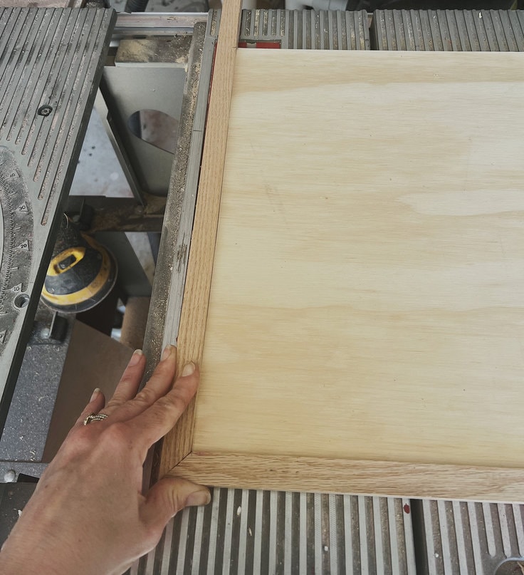 45 degree cuts make a frame that will surround the project panel and create the basketball hoop backboard for your laundry hamper.