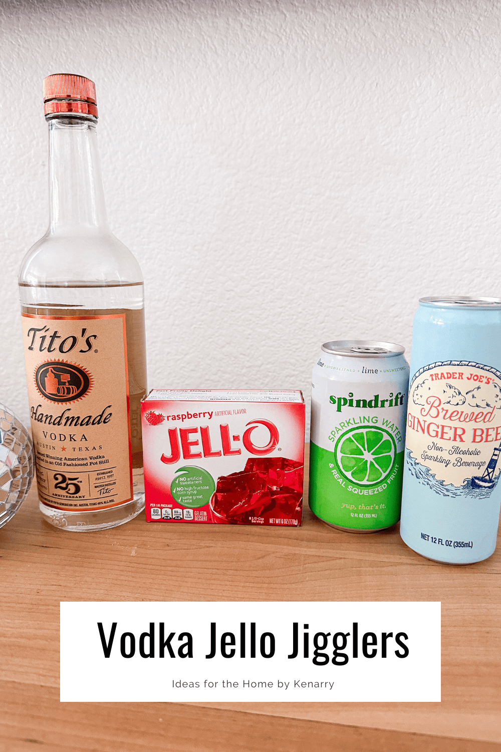 Vodka Jello Jigglers ingredients including vodka, raspberry gelatin, sparkling water, and ginger beer.