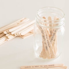 Adding popsicle sticks with written-out date night ideas and placed into a mason jar