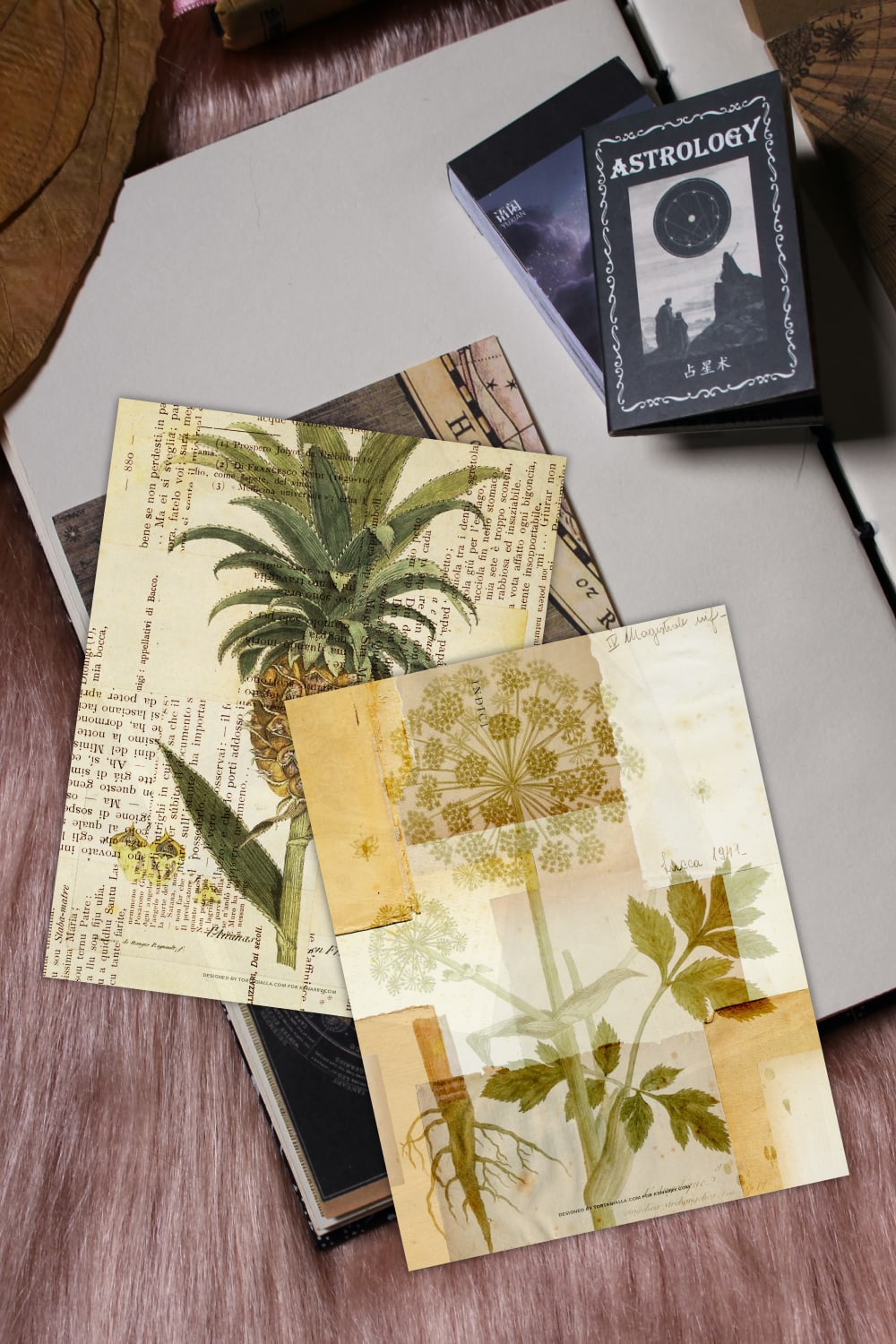 Preview of two vintage botanical style art prints on top of journal with various papers supplies around.
