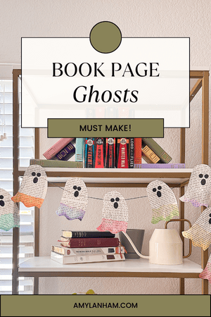 8 book page ghosts hanging from a bookshelf.