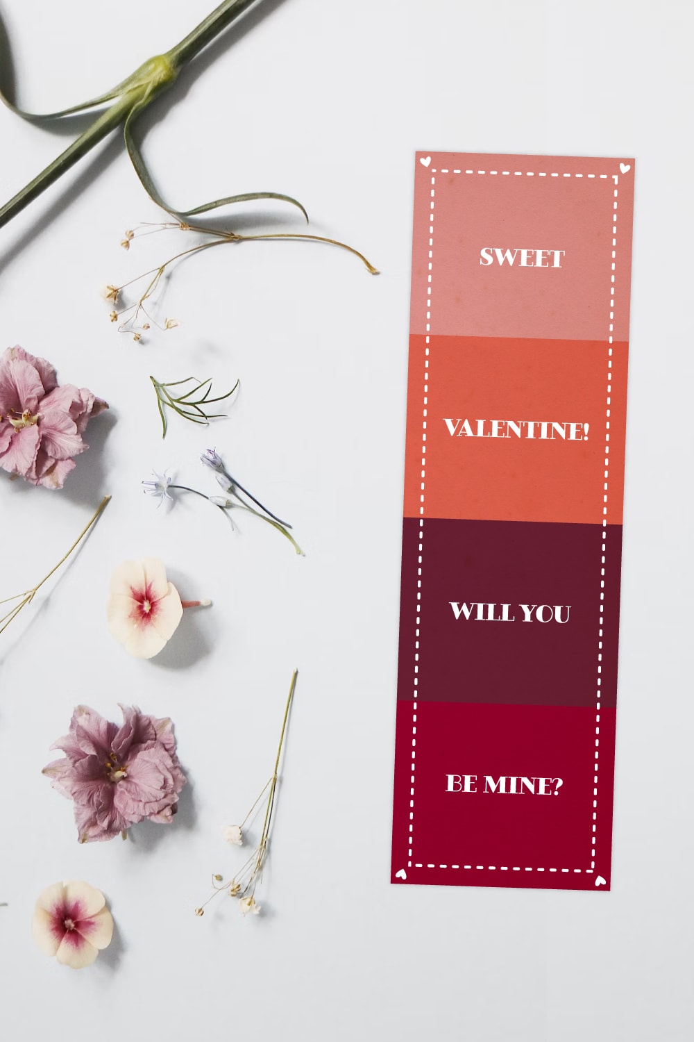 Preview of sweet valentine printable bookmark on the right side with a variety of wildflowers on the left side on a white background.
