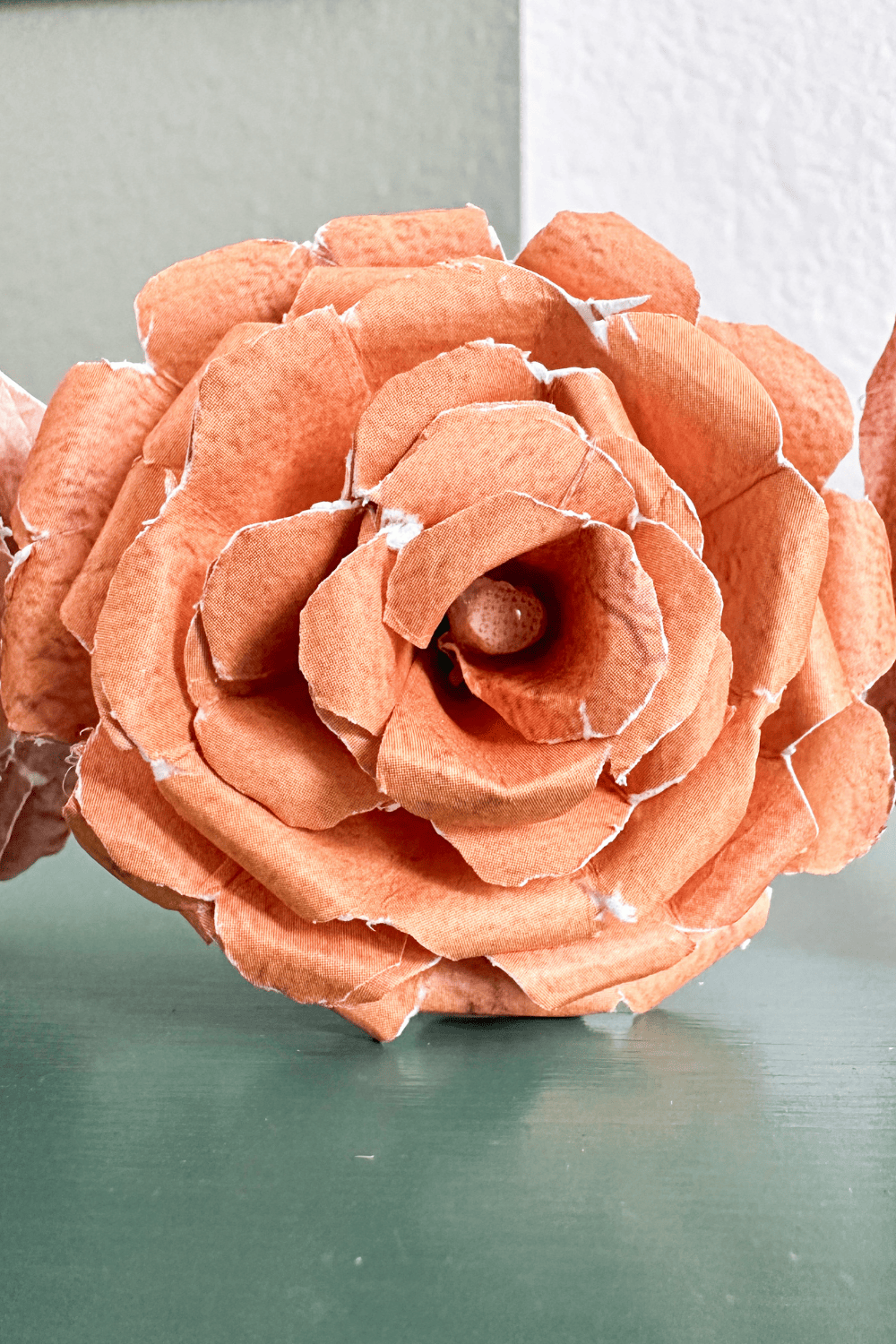 orange paper rose made with heart cut petals