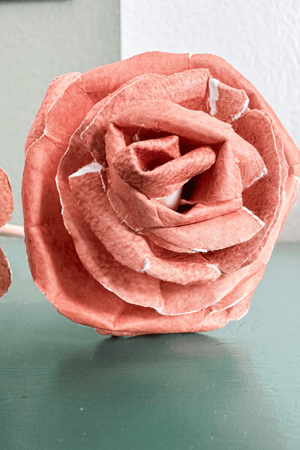 red paper rose made with arch cut petals
