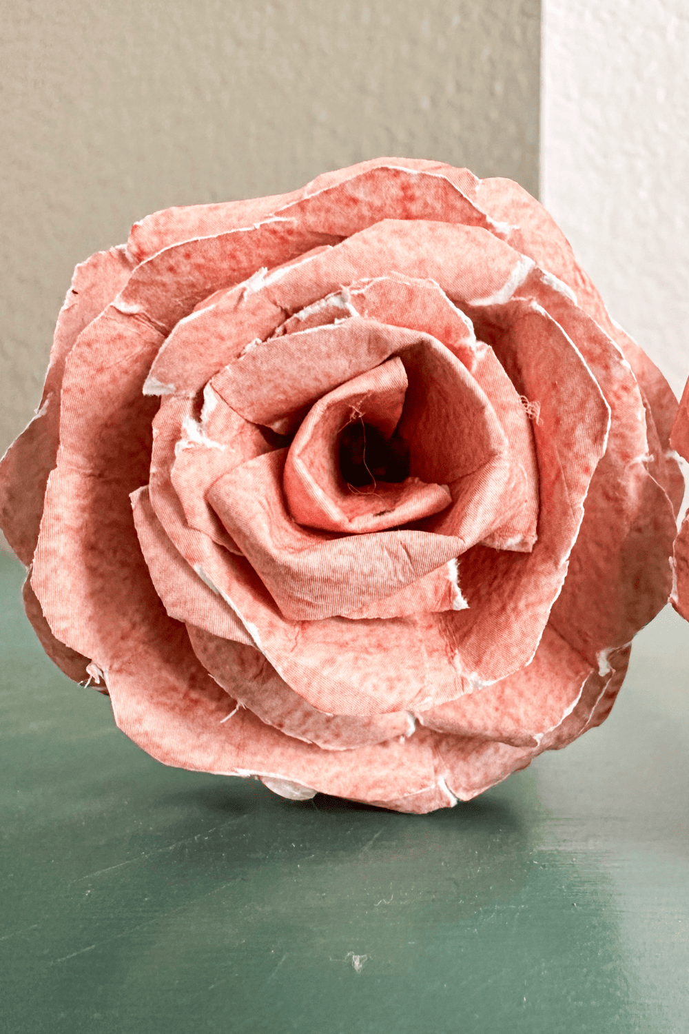 pink paper rose made with a wave cut petals