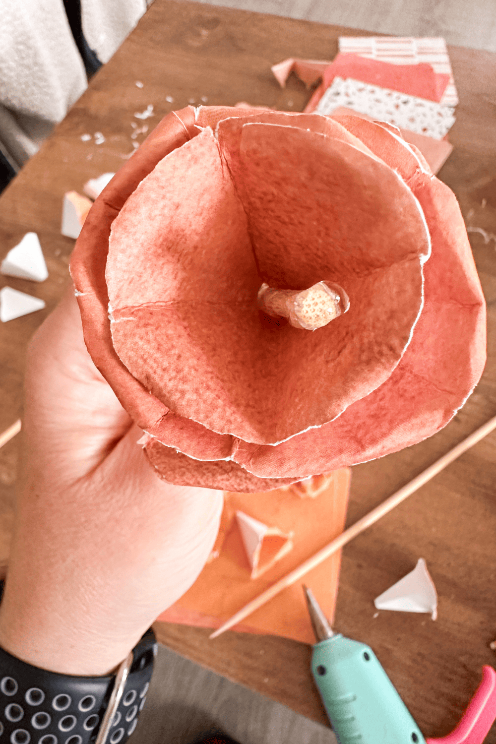 Paper rose petals started with a skewer in the middle